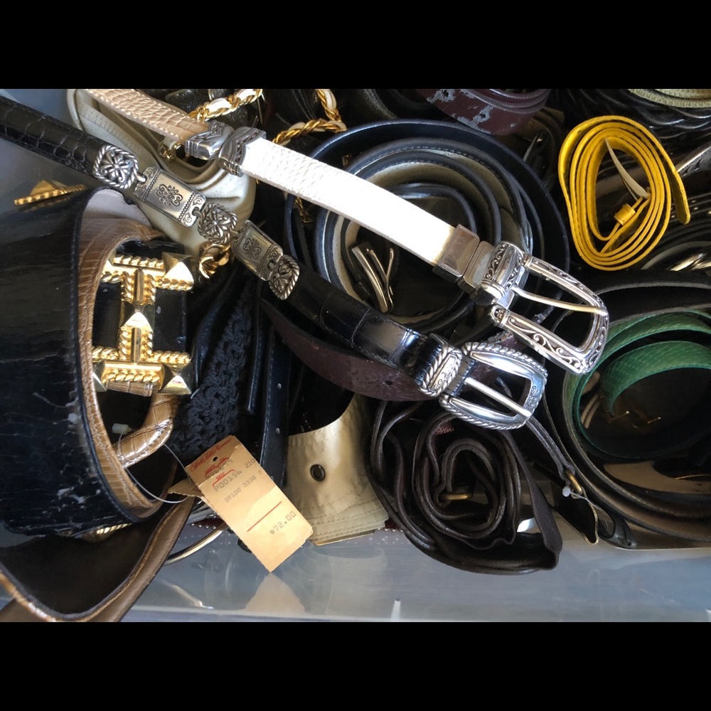 A box of belts. Some never worn.